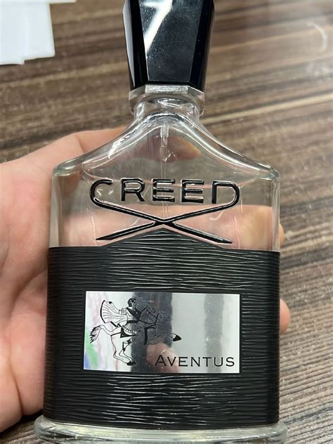 perfume creed aventus usado.